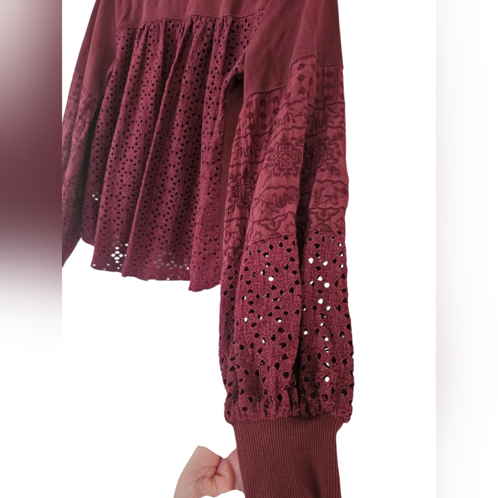 Anthropologie Burgundy Eyelet Sleeve Top.